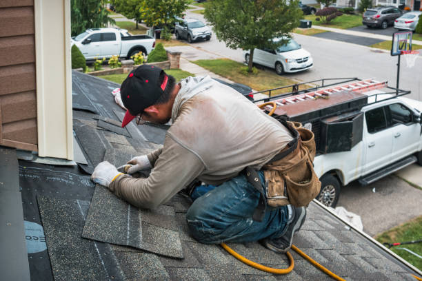 Professional Emergency Roof Repair technician working in Townsend, MA